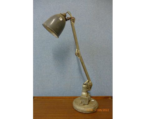 An early 20th Century industrial anglepoise work lamp 