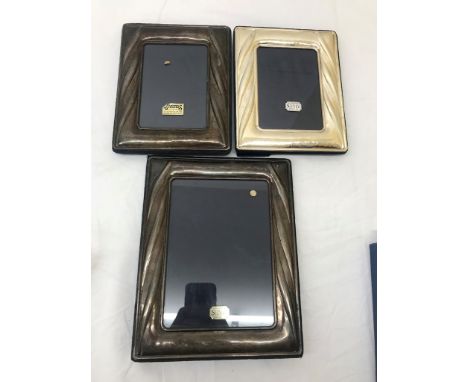 Three HM silver photograph frames by R Carr