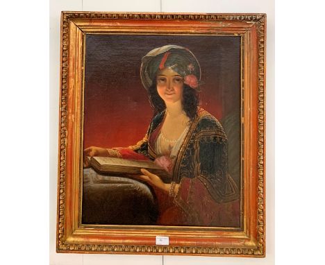 Continental School (19th century):A portrait of a lady in Orientalist dress, holding a book, 66 x 47 cm