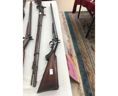 An EU SPEC hammer double barrel shotgun by Moore &amp; Co