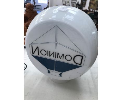 A Dominian petrol pump globe