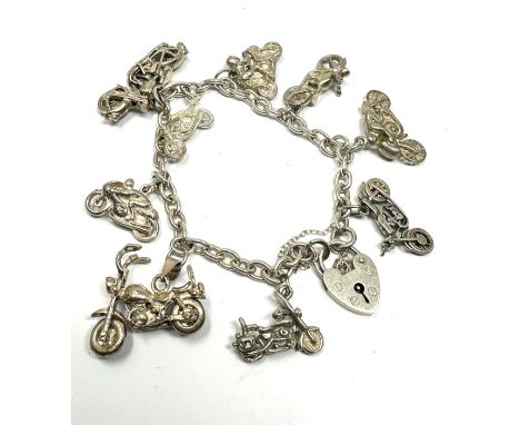 Vintage silver charm bracelet with all moter bike charms weight 50g