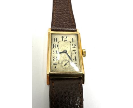 Art Deco Rolco Rolex 9ct gold gents Watch c 193os the watch case measures approx 37cm by 22cm the watch is ticking case marke