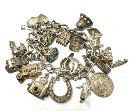 Vintage silver charm bracelet inc opening charms weight 65g