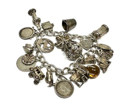 Vintage silver charm bracelet inc opening charms weight 68g
