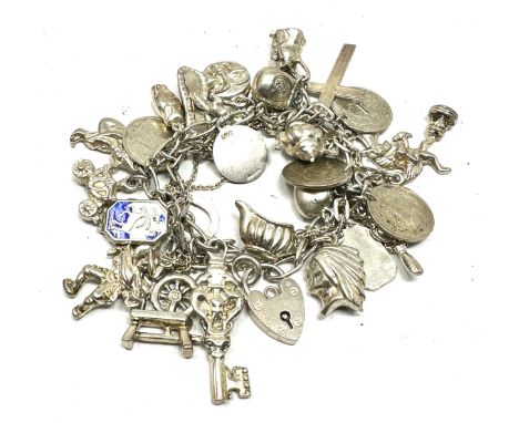 Vintage silver charm bracelet and charms weight 91g