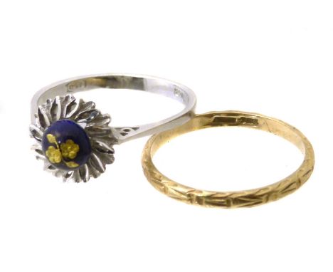 Two dress rings, to include an enamel dress ring and a band ring, both stamped 750, ring sizes N and M1/2, gross weight 3.6g.