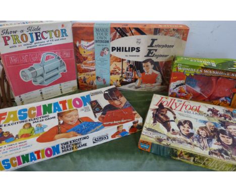 Philips interphone engineer set, show-a-slide projector complete with 84 colour pictures, Wombles washday set, Holly Foot Sav