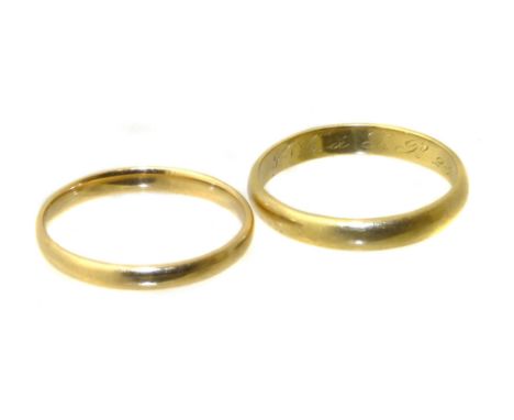 Two band rings, one with inscription dated 1907, ring sizes R and S, gross weight 5.7g. Condition reports are not available f
