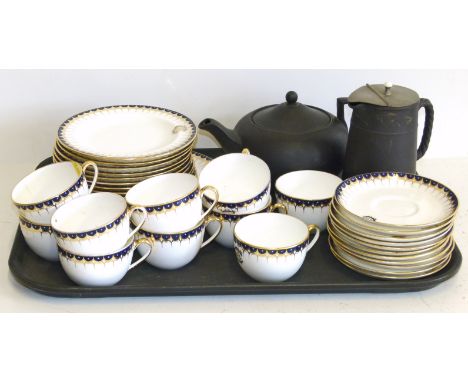 Wedgwood tea service monogrammed SWC, also a black Basalt teapot and coffee pot. Condition reports are not available for our 