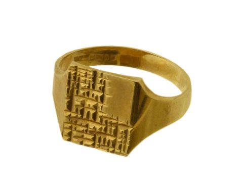 A 9ct gold signet ring, the rectangular shape textured panel with tapered shoulders, hallmarks for Birmingham, 1976, ring siz
