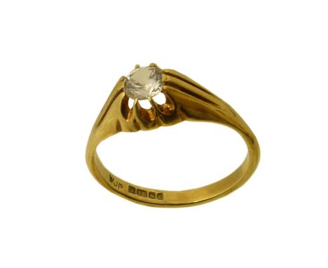 An 18ct gold paste signet ring, the circular colourless paste within a claw setting inset to the tapered band, hallmarks for 