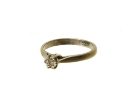 A platinum diamond single stone ring. Condition reports are not available for our Interiors Sales