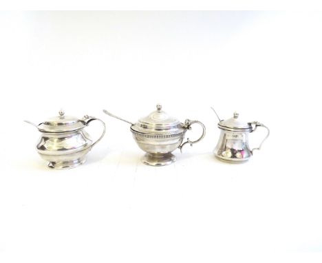 Three silver mustard pots including Roberts and Bell with beaded rim. Sheffield 1924 together with Birmingham 1918 and Cheste