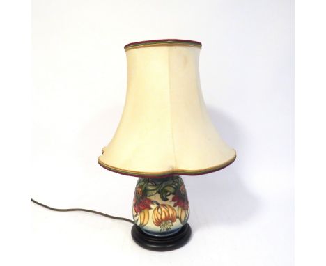 A Moorcroft Anna lily pattern table lamp with shade