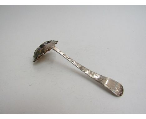 A Thomas Smily Victorian silver berry sifter ladle with gilded bowl and foliate engraved handle, London 1864, 33.8g      