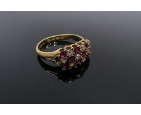 An 18ct gold ruby and diamond ring. Birmingham 1888. Size Q/R, 4.3g