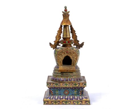 Gilt cloisonne stupa Chinese, 19th Century the stupa of architectural form with a crown bumper, the neck surmounted by twelve