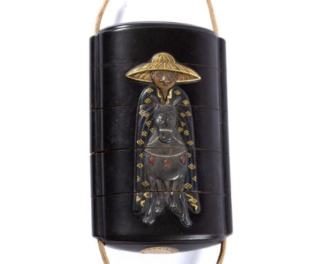 Four-case roiro (black) lacquer inro Japanese, 19th Century decorated in takazogan with Toba seated upon a mule in a forward 
