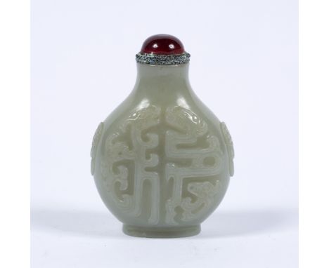 Mutton fat jade snuff bottle Chinese, 19th Century decorated with kuyi dragons, with a glass stopper 6.5cm high