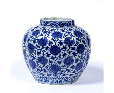 Ming style blue and white porcelain lobe shaped globular jar Chinese, Kangxi decorated with an all over Indian lotus and tend