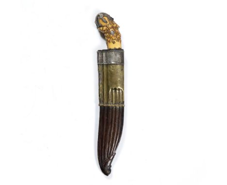 Small dagger Indian the handle made of ivory carved with scrolling design and mounted with white metal grips 36cm across