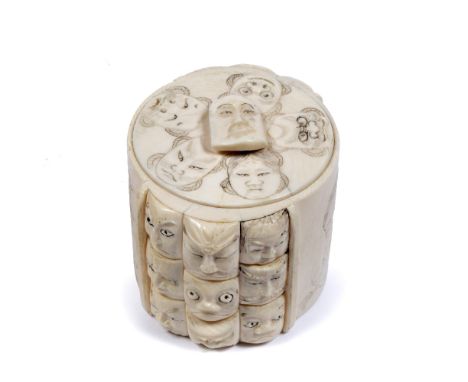 Ivory circular box and cover Japanese, late Meiji with inset cover, sides and cover carved in low and high relief with Noh ma