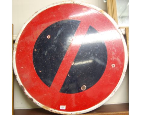 A circular enamel roadsign, dia.70cm
