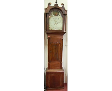 An early 19th century mahogany crossbanded and further satinwood strung longcase clock, having a painted arched dial signed G