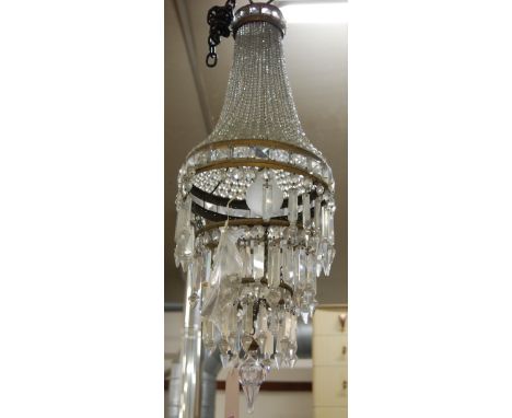 A cut glass and brass framed hanging ceiling light 