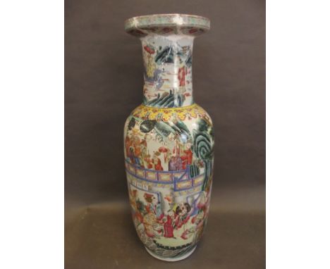 A large Cantonese enamel vase decorated with numerous figures and animals in a continuous landscape, 24½" high (AF) 