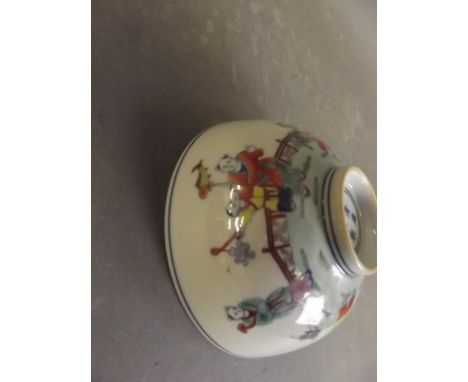 A Chinese Doucai porcelain bowl decorated with children playing in a garden, 6 character mark to base, 4½" diameter 