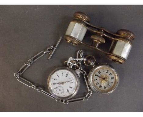 A silver cased fob watch, the silver and gilt face with Roman numerals, the case with engraved decoration, another silver cas