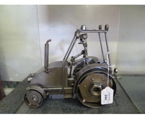 A Nuts and bolts model of a tractor, 21cm high