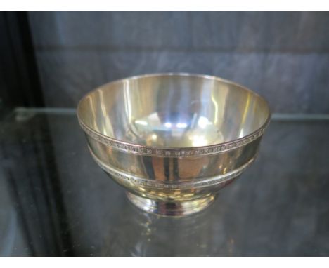 A silver bowl on single foot having Celtic decoration, Birmingham 1926