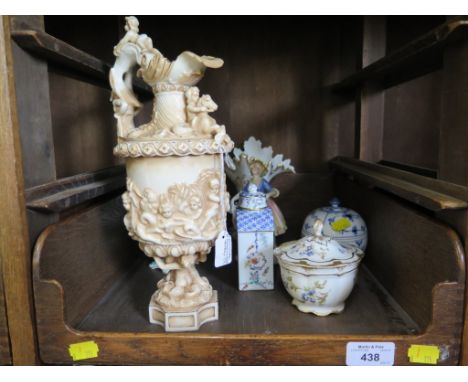 A Rudolstadt Volkstedt ewer, relief decorated with putti 31.5cm high, a Forstenberg porcelain tea caddy, a Karl Ens figure of