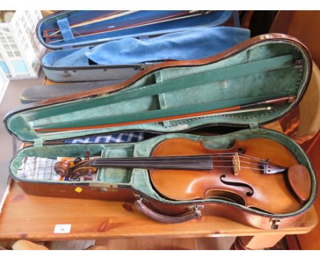 A viola, labelled Jofredus Cappa Fecit Salutus anno 1686, length of back 40cm, with bow stamped Swiss made and oak case label