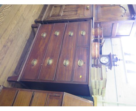 A late George III mahogany chest of drawers, with two short over three long graduated drawers on later outsplayed bracket fee
