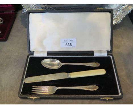 A cased set of child's knife, fork and spoon