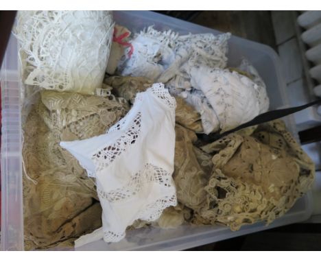 An Edwardian silk and Irish lace eiderdown 238cm x 213cm, an Edwardian lace shawl, approx 5m long, various lace tablemats