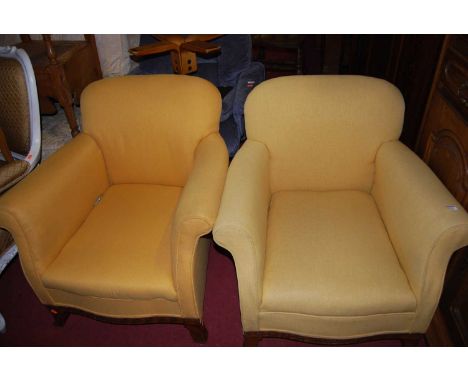 A pair of circa 1900 and later mustard upholstered armchairs, each raised on splayed forelegs, width 80cmCondition report: On