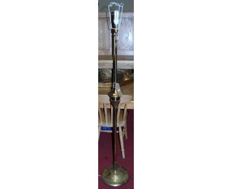 A gilt brass standard lamp in the classical style