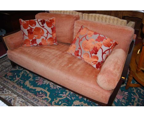 A contemporary hardwood and double split cane inset three seater Bergere sofa, width 187cm