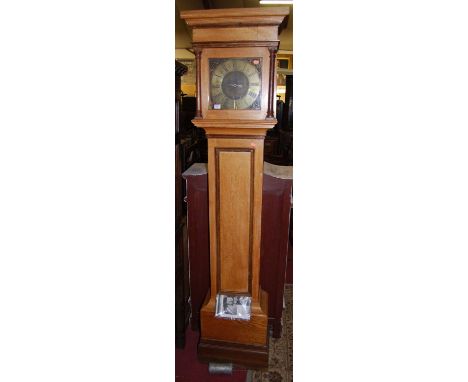 A light oak longcase clock by James Mogg of Basingstoke, having 10" square brass dial, thirty hour movement, with pendulum an