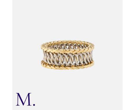 HERMES. A Woven Band in 18K yellow and white gold, with solid mesh design.Size: M1/2Weight: 7.6g