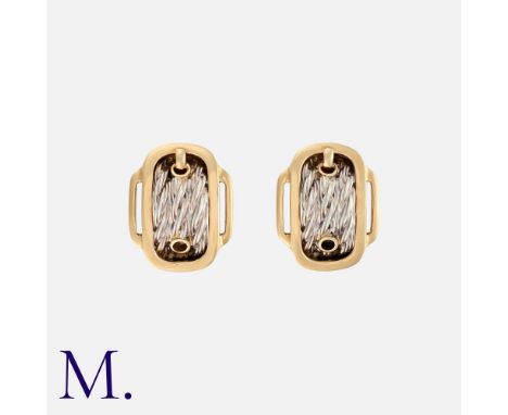 HERMES. A Pair of Earclips in 18K yellow gold and silver, in a belt buckle design.  Signed Hermes Paris.Size: 1.9cmWeight: 15