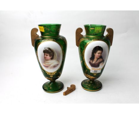 Two late 19th century glass vases each with ceramic panel portrait of ladies 