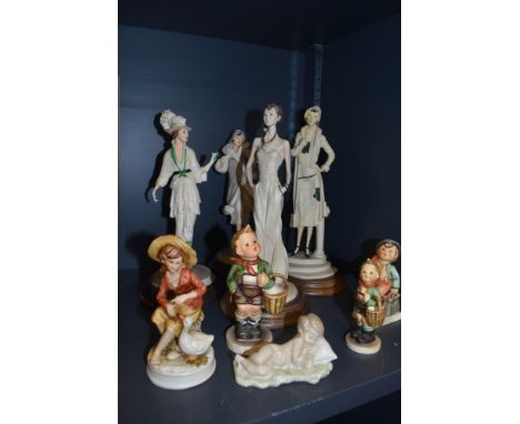 A selection of figures including Lladro and Nao