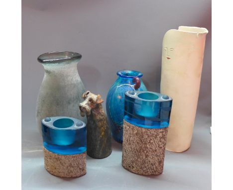 A miscellaneous collection of items to include two art glass vases, two concrete and glass candle sticks, a ceramic model of 