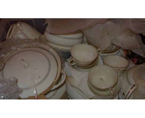 A Japnese Noritake ivory china 'Glorianna' part dinner service, comprising plates, tureen, teacups, tea pot, jug etc 